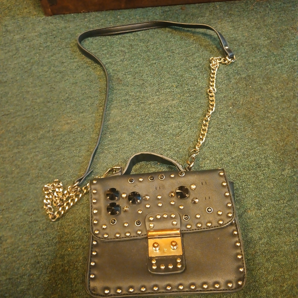 Studded Black Handbag with Gold Accents